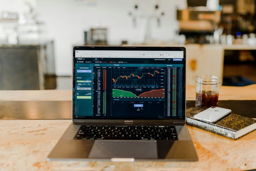 laptop showing crypto market performance