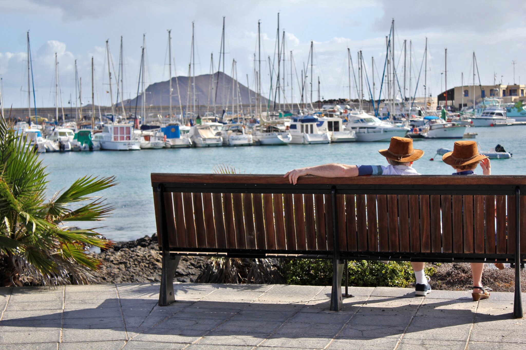 two retirees sitting on bench