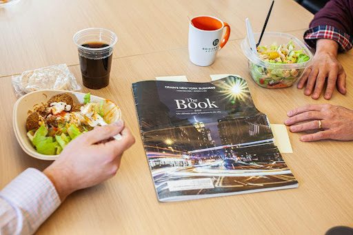 Crains 2026 The Book on lunch table at Bridgewater Advisors