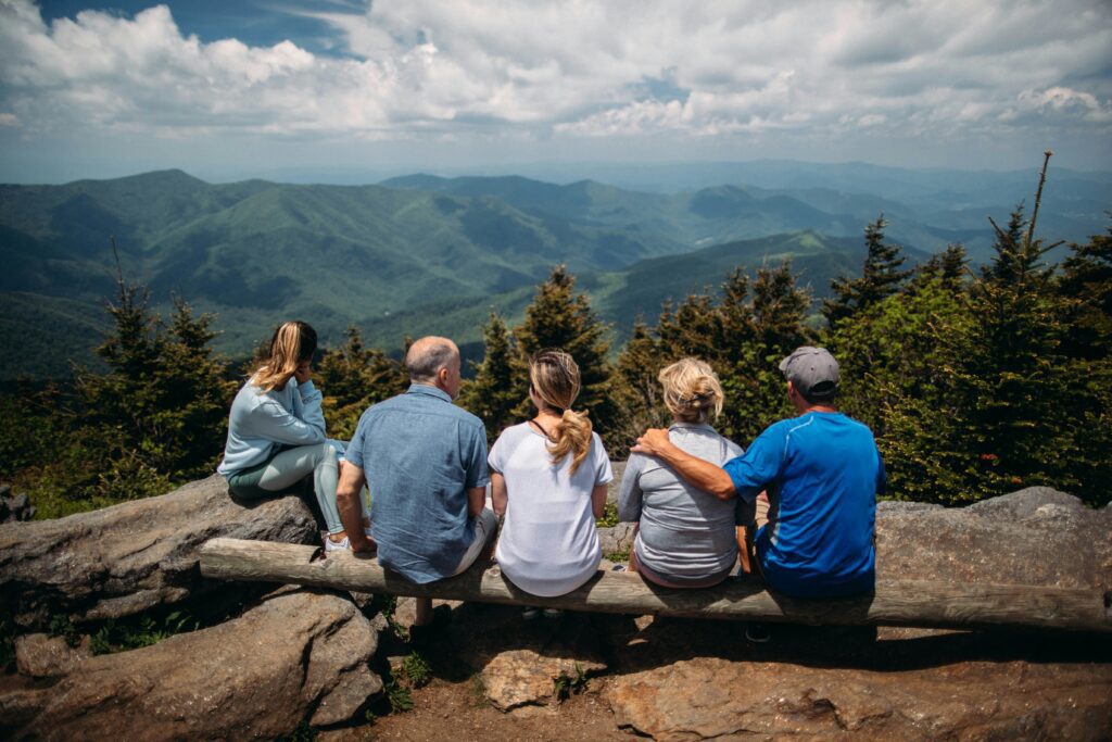 Family looking at a mountain valley