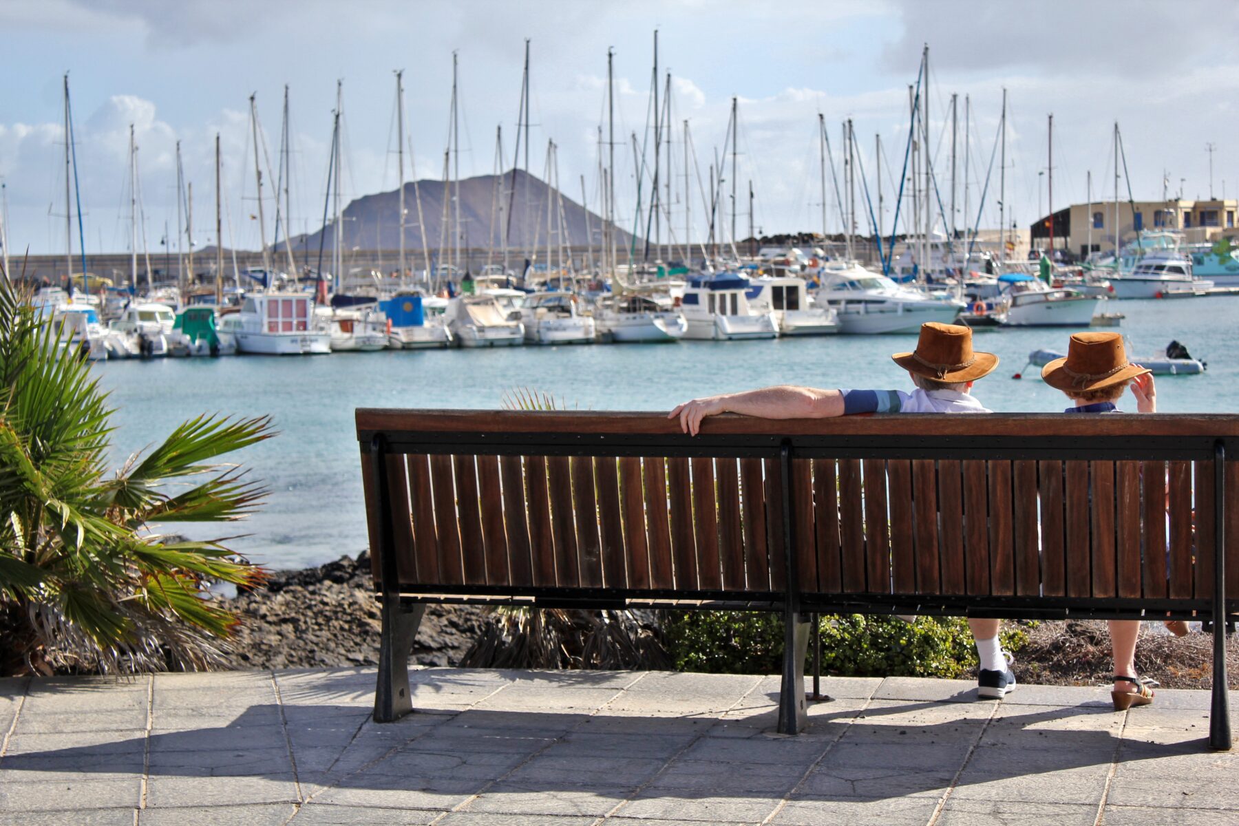 two retirees sitting on bench